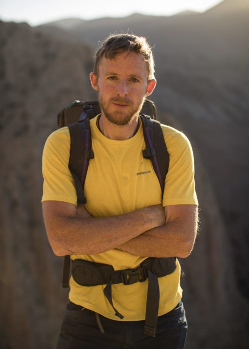 Tommy Caldwell poses for a portrait after just climbing to the top of Tadrarate via a 500m, 7c+ climbing route. He's climbing with Alex Honnold in Taghia, Morocco. September 20th, 2016.